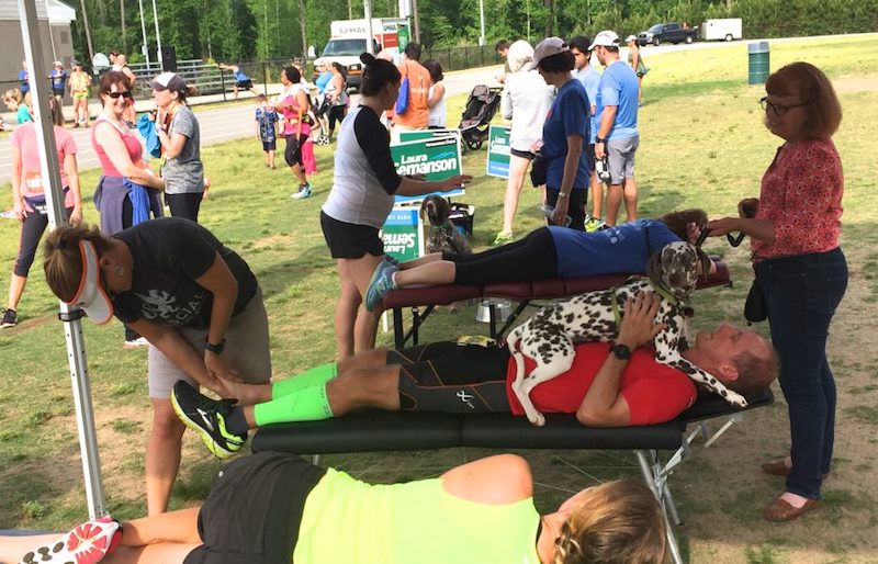 Atlanta Sports Chiropractors treat runners for free at Fiesta 5k/15k